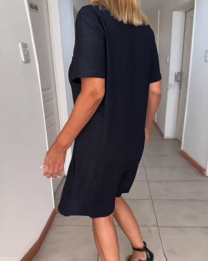 Twisted short-sleeved dress with V-neckline